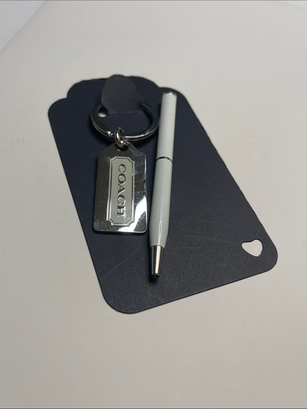 Coach Silver Rectangular Logo Tag Keychain and Coach Pen - Picture 5 of 6